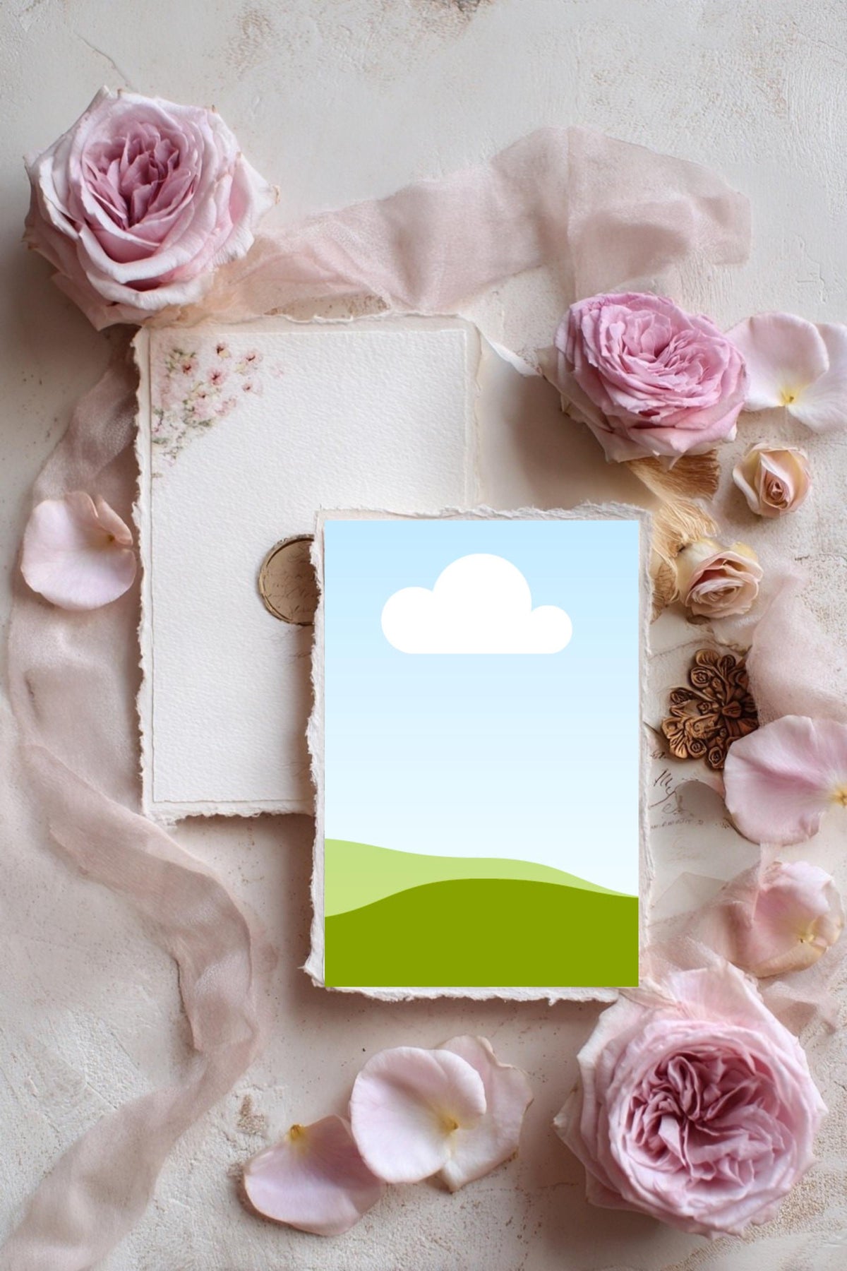Garden invitation card mockup with cloud-and-hills design surrounded by roses