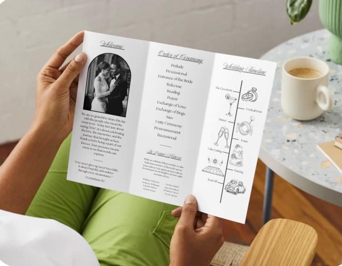 Tri-fold wedding program template held up, showing photo, itinerary text, and icon column
