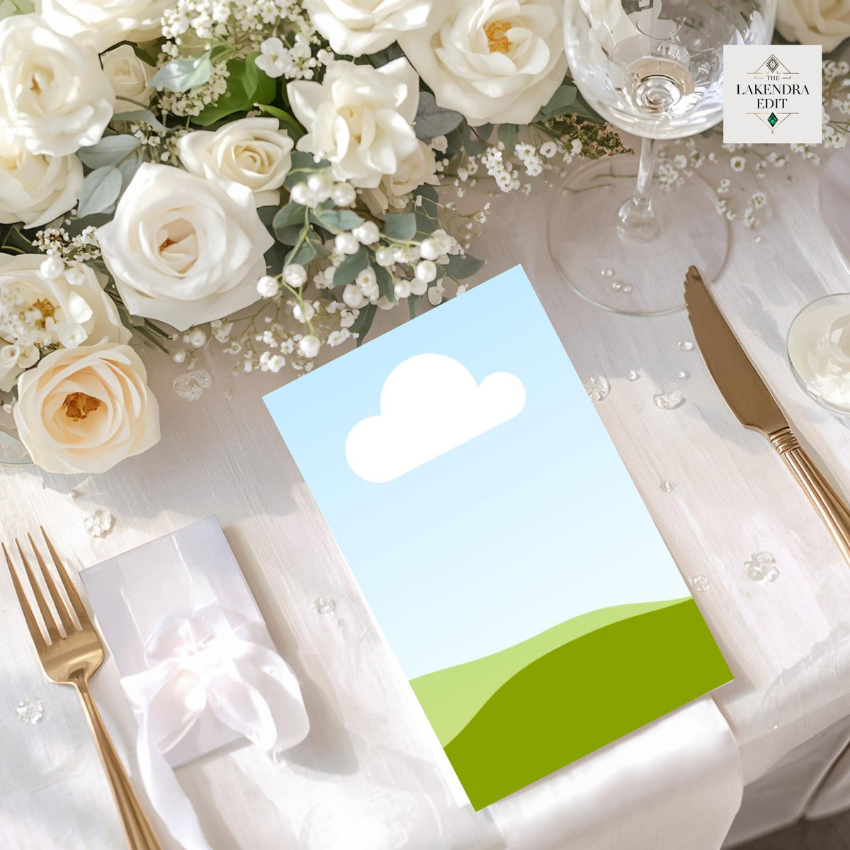 Landscape mockup card with cloud icon and green hill on easel in a floral setting