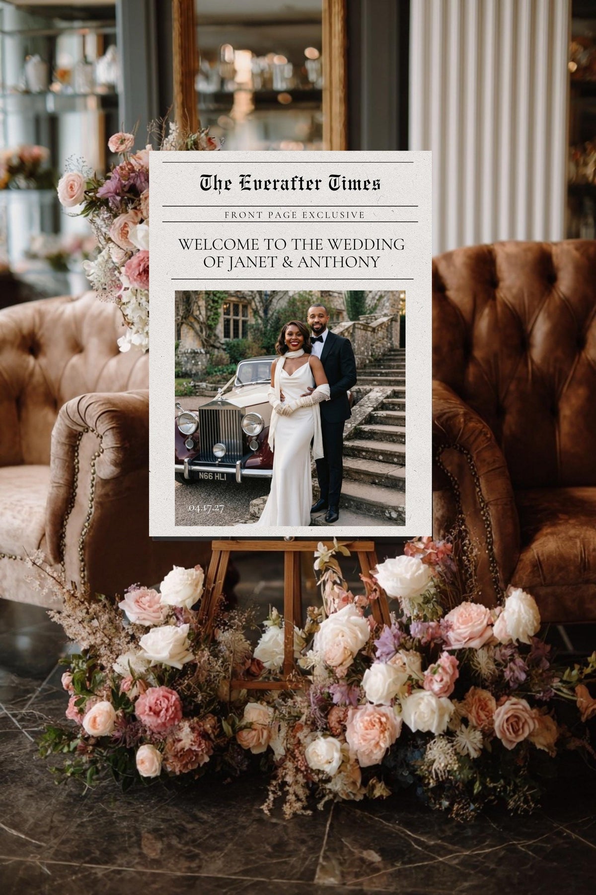 Newspaper wedding welcome sign template on easel with floral border and couple photo