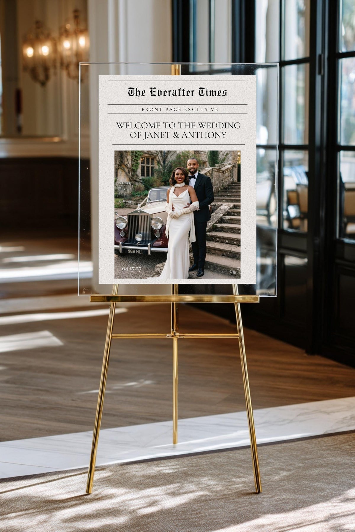 Newspaper-style wedding welcome sign template with couple photo on gold easel